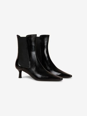 Elasticated black leather ankle boots