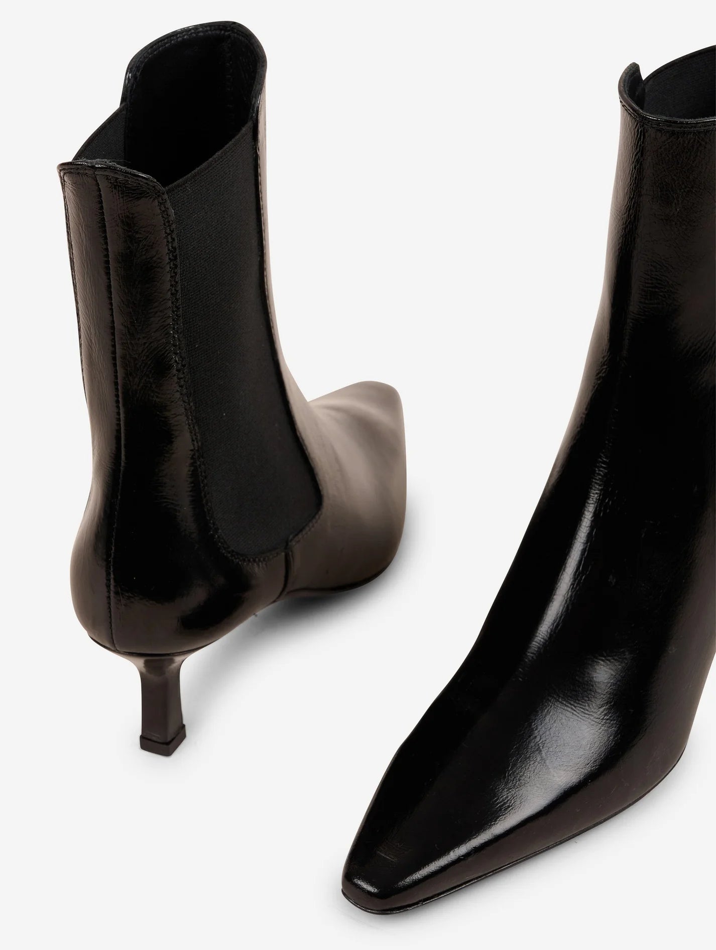 Elasticated black leather ankle boots